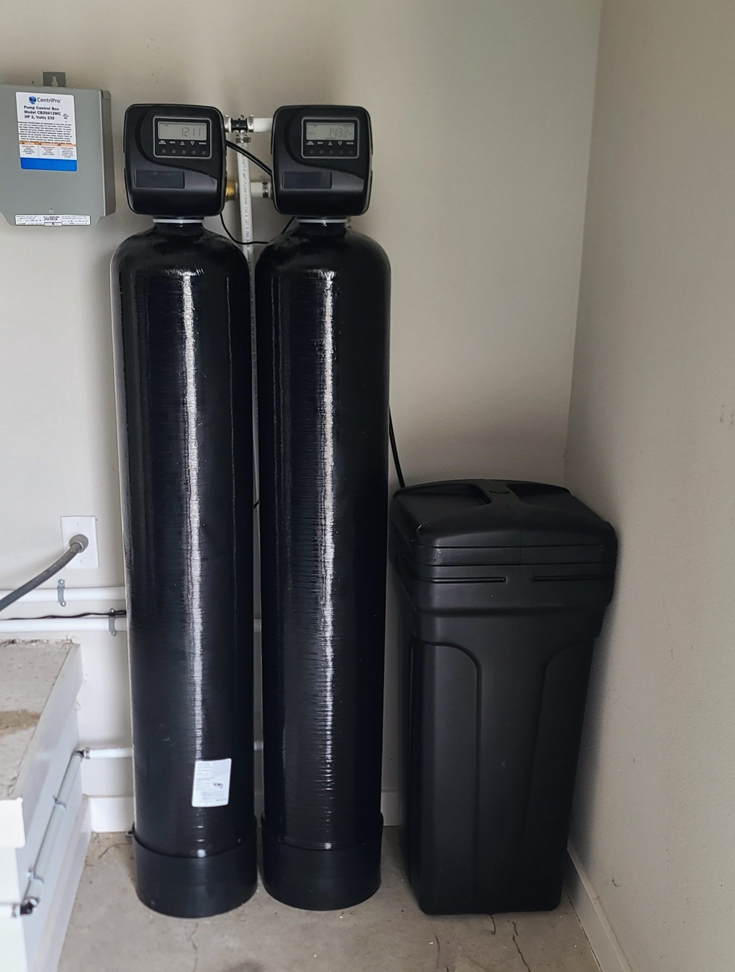 Professionally installed dual-tank water treatment system